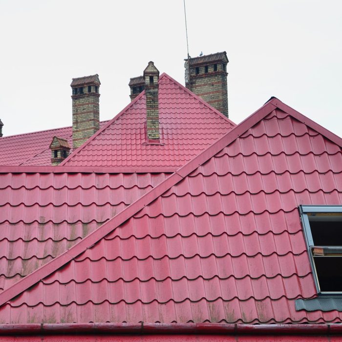 Fragment of a metal roof of the restored old multi-storey building in Lviv, Ukraine